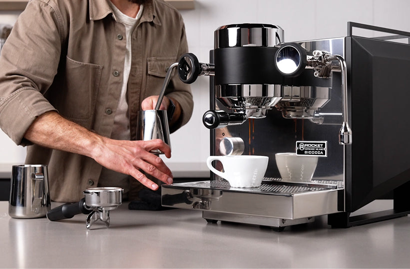 Prosumer espresso machine pulling a shot on a modern kitchen counter - Seattle Coffee Gear