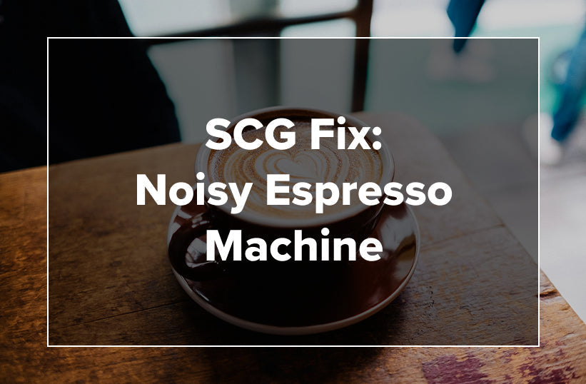 An overhead shot of a latte on a wooden table with text reading SCG Fix: Noisy Espresso Machine